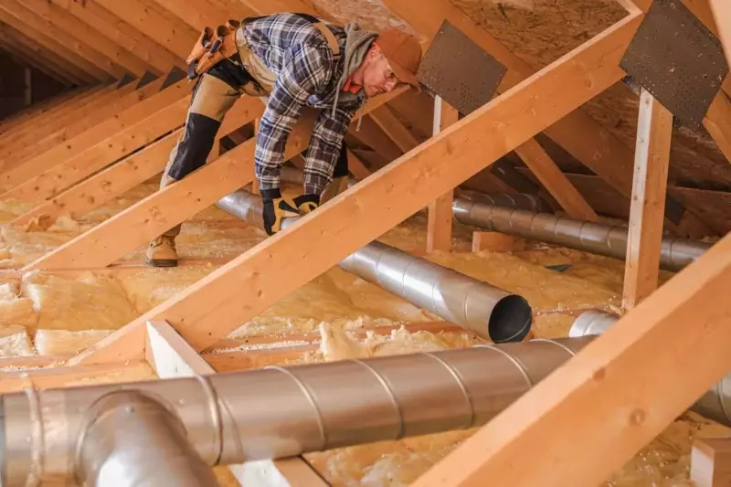 HVAC-tech-installing-residential-ductwork